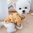 Load image into Gallery viewer, Small white dog wearing yellow ribbed turtleneck shirt with black polka dots and ruffled collar
