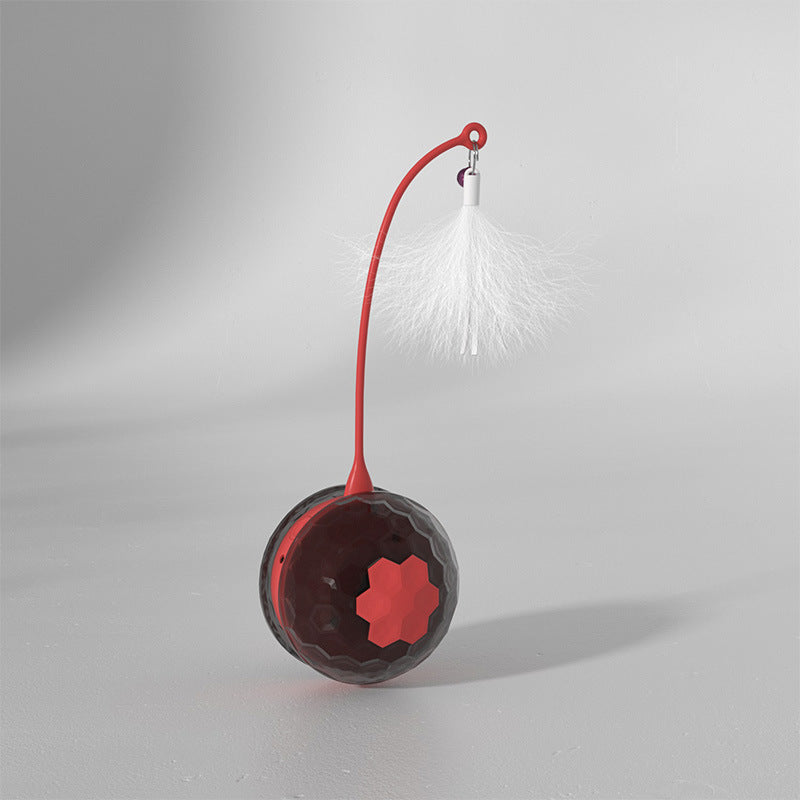 Close-up of red and black automatic rolling cat toy with feather teaser on a plain white background