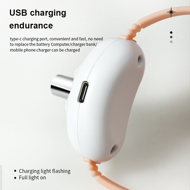 Close-up showing USB Type-C charging port on peach laser collar