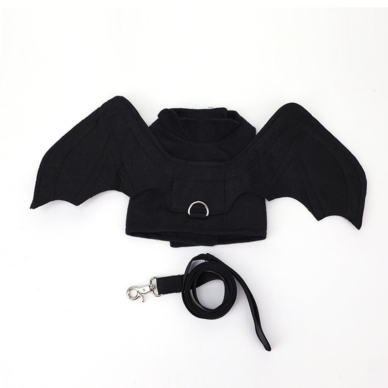 Top-down front view of black bat harness with quilted bat wings and attached black leash