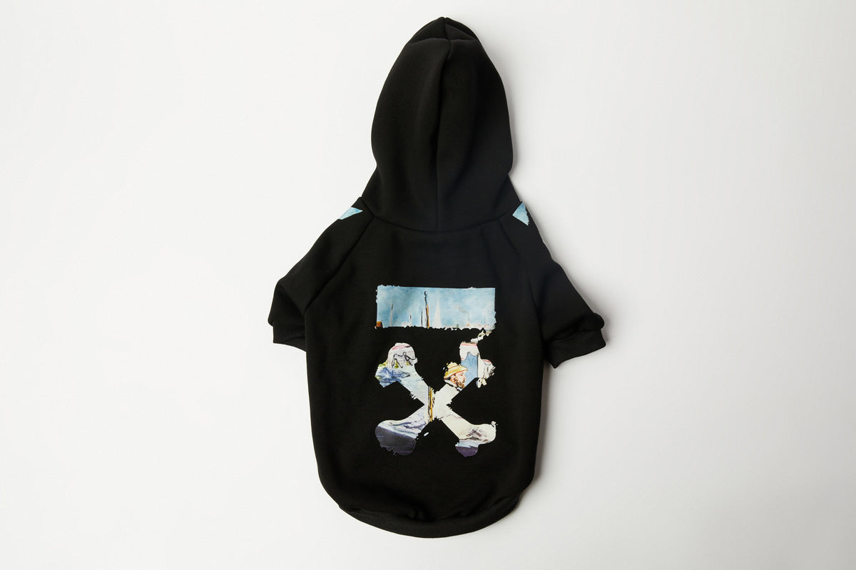 Laid flat black dog hoodie with hood and painterly graphic print on the back displayed on white background
