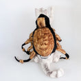 Load image into Gallery viewer, Back angle of white cat stretching one paw while wearing plush spider costume with detailed legs
