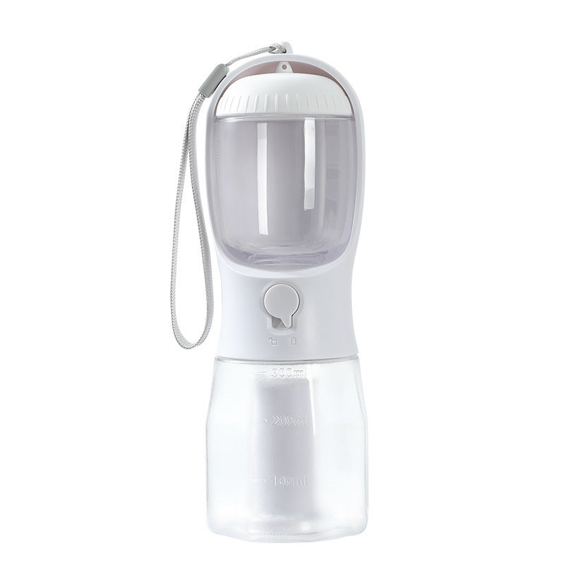 White 3-in-1 portable dog water and food bottle showing transparent food container and water reservoir