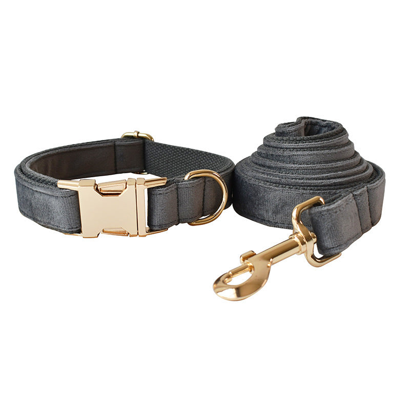 Gray velvet adjustable dog collar featuring gold metal buckle and D-ring