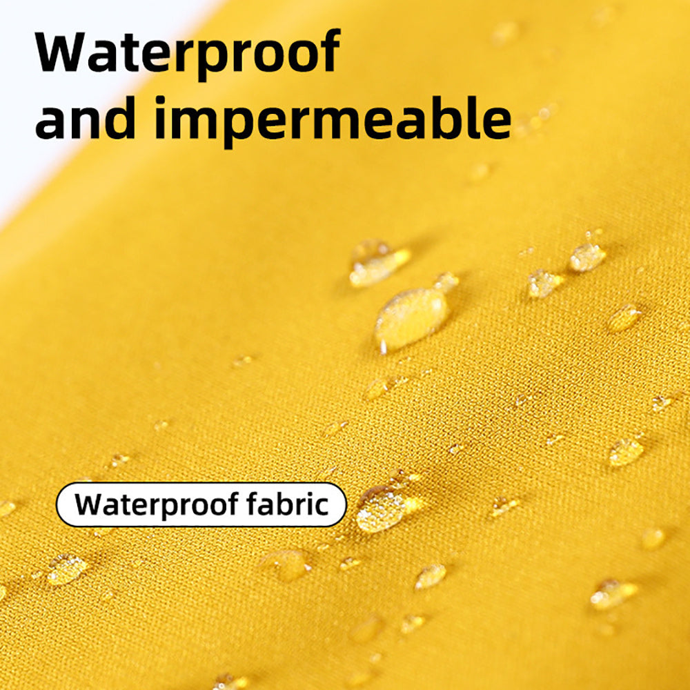 Close-up of waterproof yellow fabric of dog raincoat with water droplets on surface