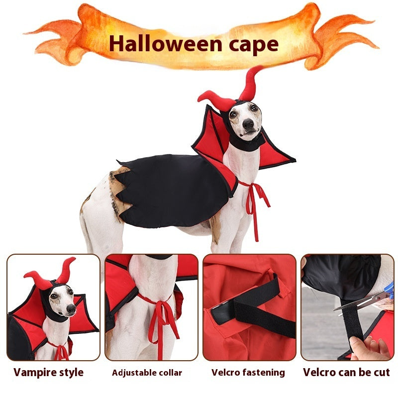 White dog wearing a black and red vampire cape and hood with red horns showing adjustable collar, Velcro fastening, and customizable Velcro strip details