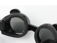 Load image into Gallery viewer, Showing flexibility and foam padding inside black pet goggles
