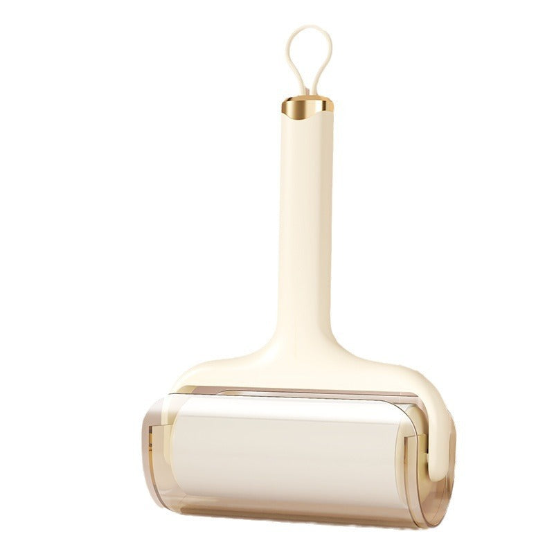 Beige handle sticky hair roller with transparent roller cover isolated on white background