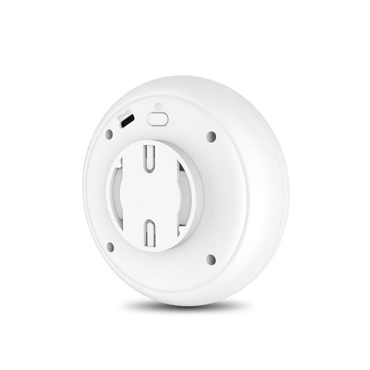 Back view of white round pet odor purifier showing power button and USB charging port