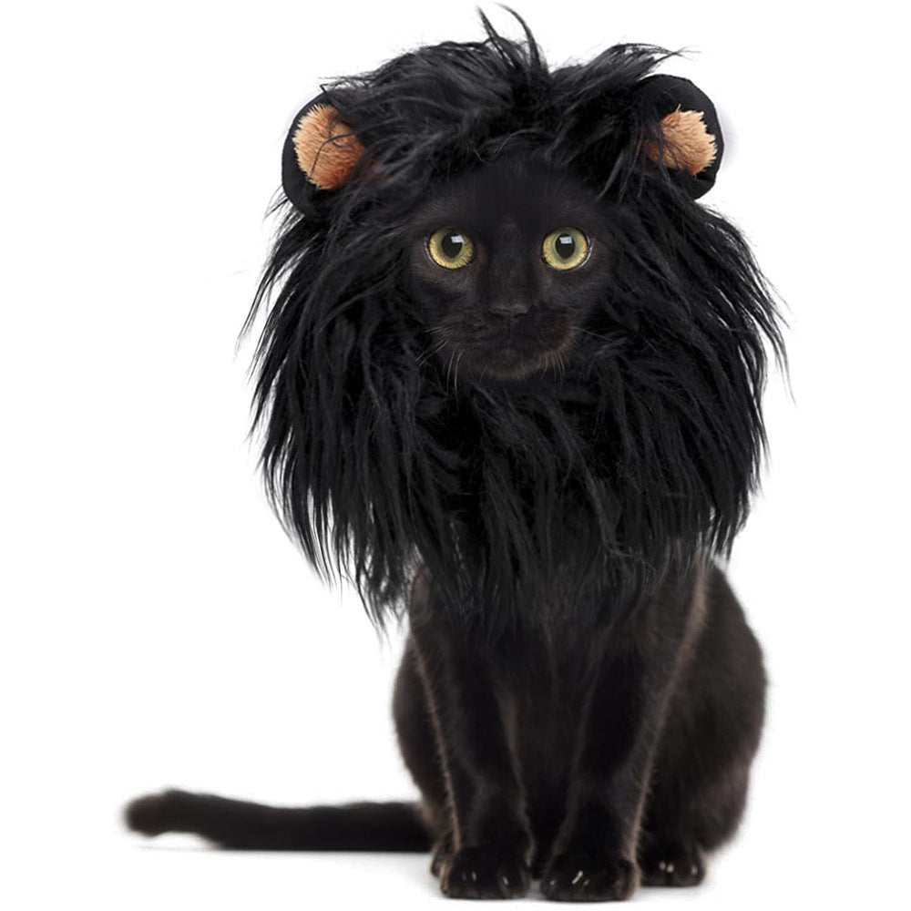 Black cat wearing a lion mane pet headgear with fluffy black fur and round ears