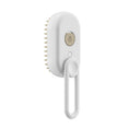 Cargar la imagen en la vista de la galería, White pet brush with beige spray button and looped handle, side angle
