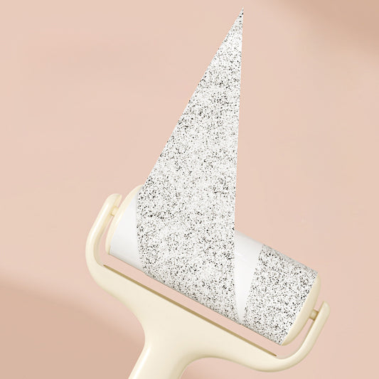 Close-up of sticky roller paper peeling to show adhesive surface
