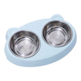 Load image into Gallery viewer, Light blue cat-shaped plastic double bowl stand with shiny stainless steel bowls inserted
