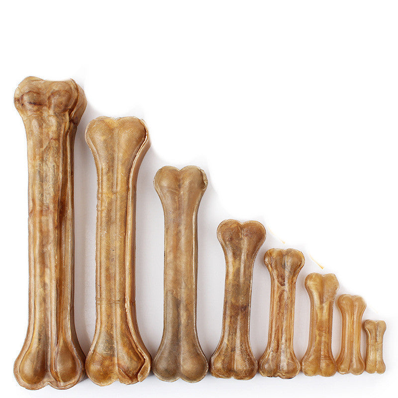 Lineup of dog chew bones in increasing sizes from smallest to largest in natural brown color