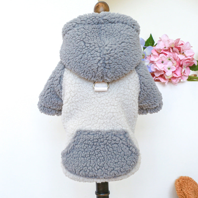 Grey and white lamb fleece dog sweater on a mannequin with hood and leash ring on back