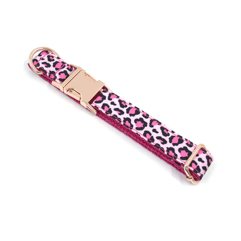 Flat view of pink leopard print dog collar showing rose gold buckle and D-ring