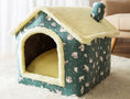 Cargar la imagen en la vista de la galería, Green plush pet house with polar bear design on white carpet
