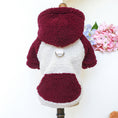 Cargar la imagen en la vista de la galería, Deep red and white lamb fleece dog sweater on a mannequin with hood and metal leash ring visible
