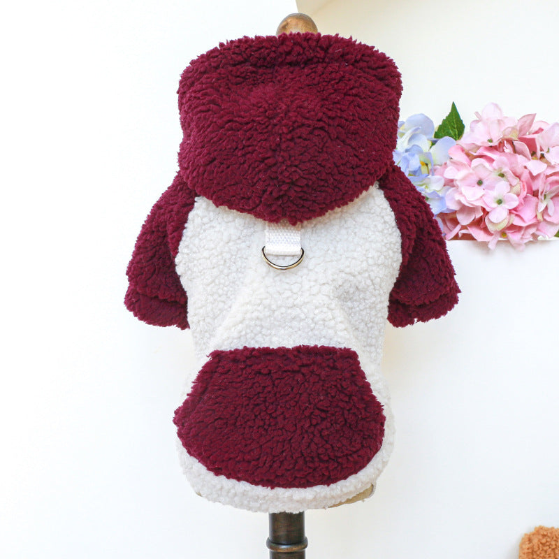 Deep red and white lamb fleece dog sweater on a mannequin with hood and metal leash ring visible