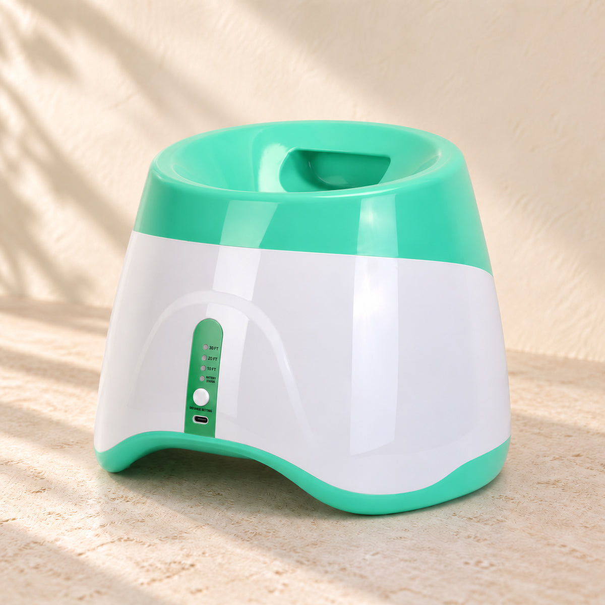 Top loading hopper and integrated handle of green dog ball launcher