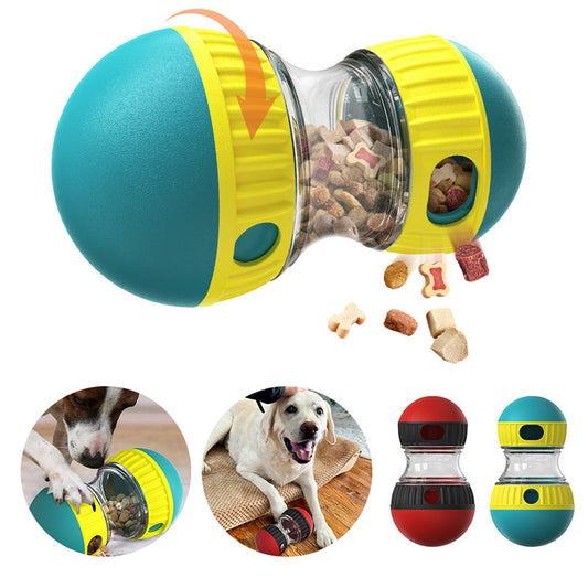 Close-up of teal/yellow dog food dispensing toy showing treats being released as toy rotates