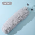 Load image into Gallery viewer, Gray plush caterpillar cat toy shown on light blue background with curled antennae
