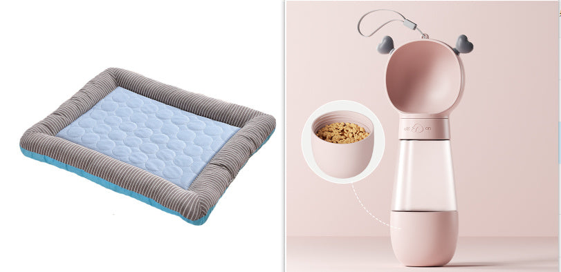 Blue cooling pet bed mat beside pink pet feeder featuring heart shaped handles and food compartment.