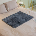 Cargar la imagen en la vista de la galería, Dark navy blue plush pet blanket spread flat on a beige bed without pet
