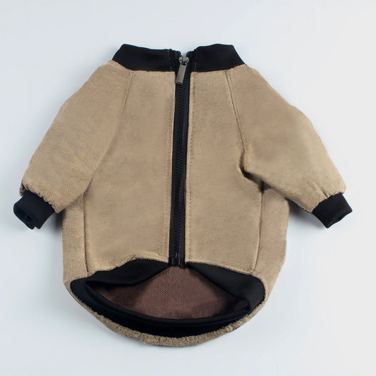 Khaki and black dog jacket laid flat showing rear zipper and elastic cuffs