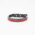 Load image into Gallery viewer, Close-up of bright red rhinestone PU pet collar laid flat on white background
