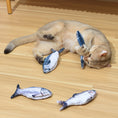 Load image into Gallery viewer, Cat playing with multiple soft fabric fish cat toys on wooden floor
