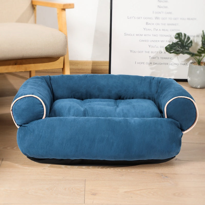 Navy blue velvet plush pet bed with thick cushioned support and piping detail