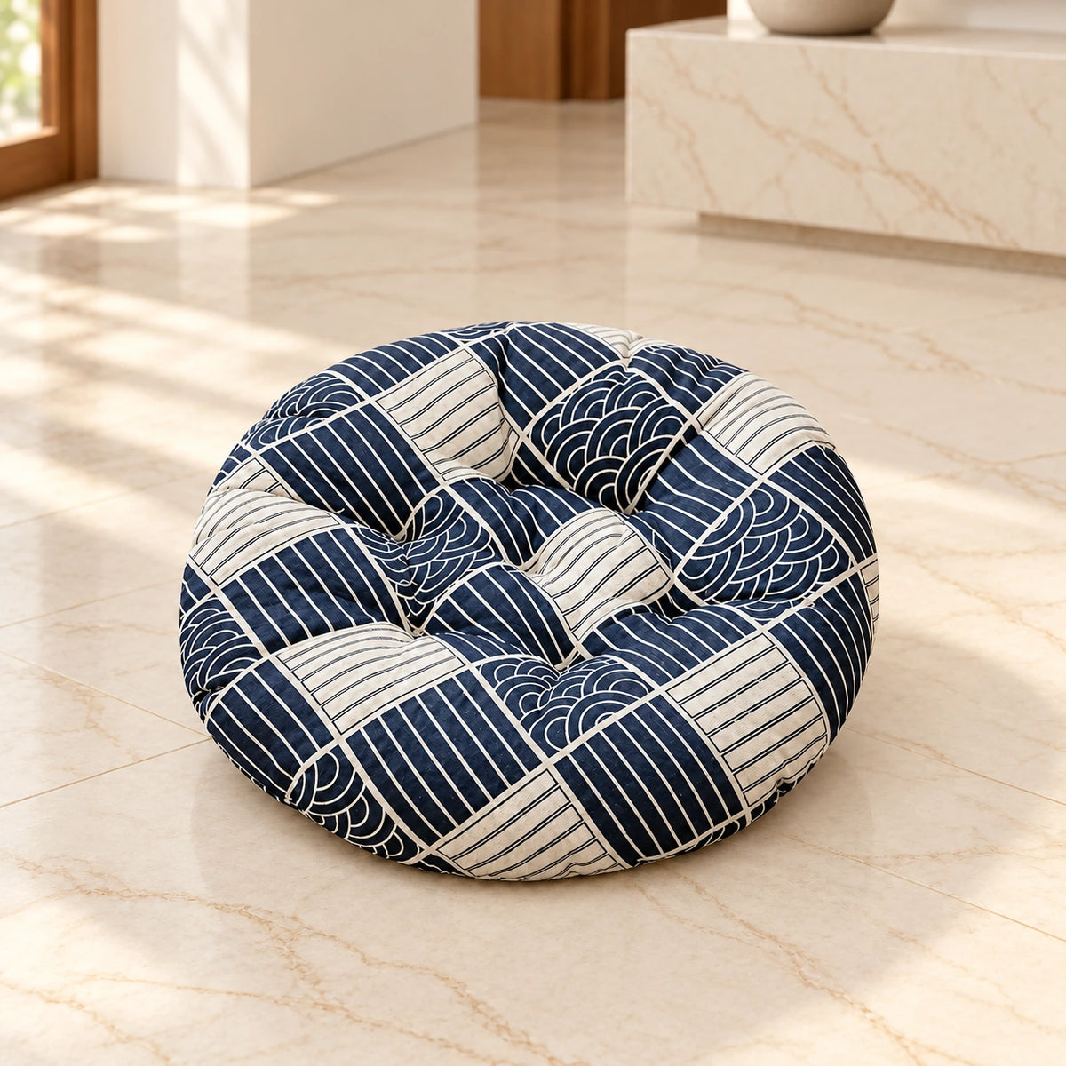 Separate navy and white patterned round tufted mat for rattan cat bed