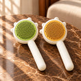 Load image into Gallery viewer, Pack of one green comb and one yellow comb on brown marble
