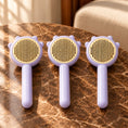 Load image into Gallery viewer, Pack of three purple combs on brown marble
