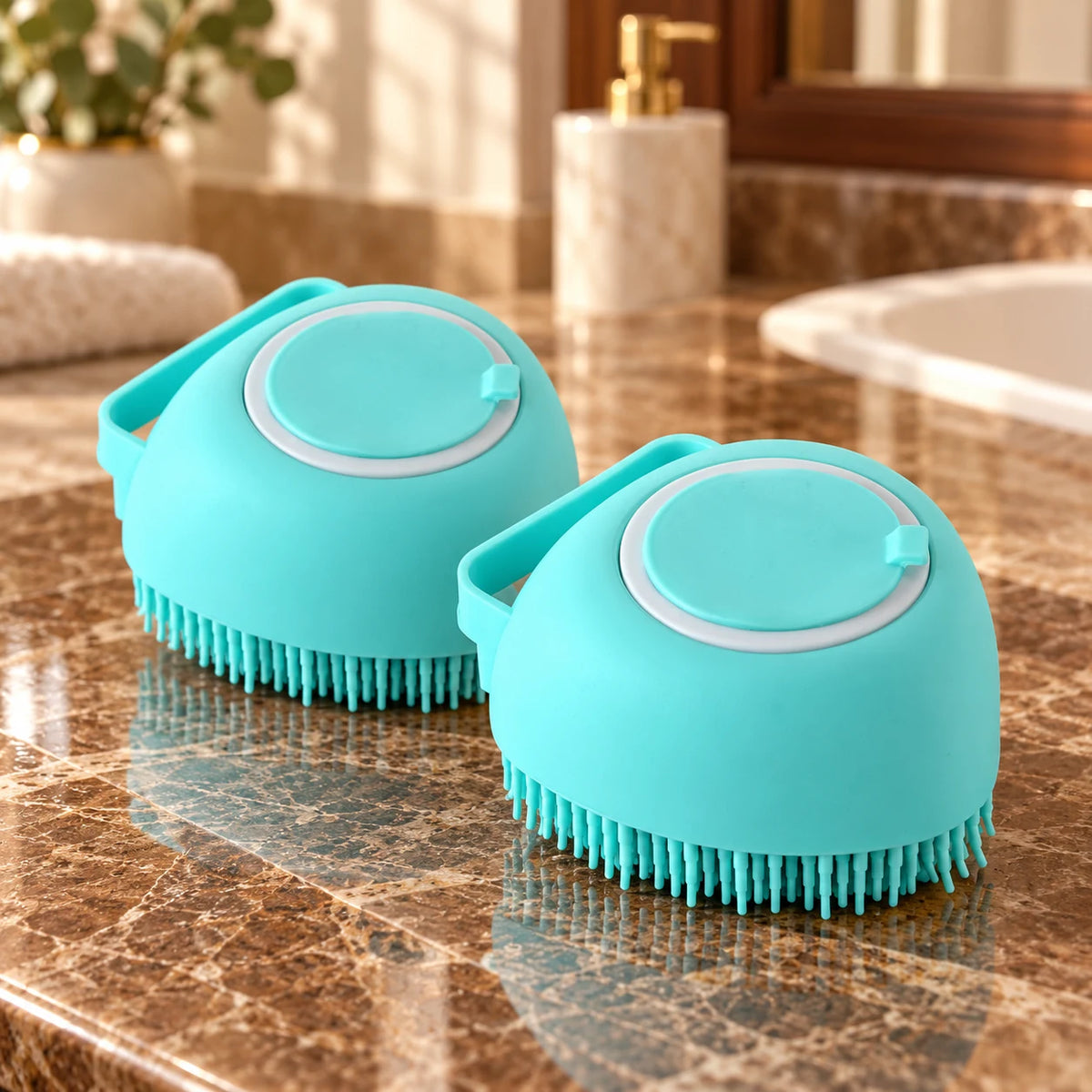 Two turquoise smooth-bodied silicone pet bath brushes on brown marble