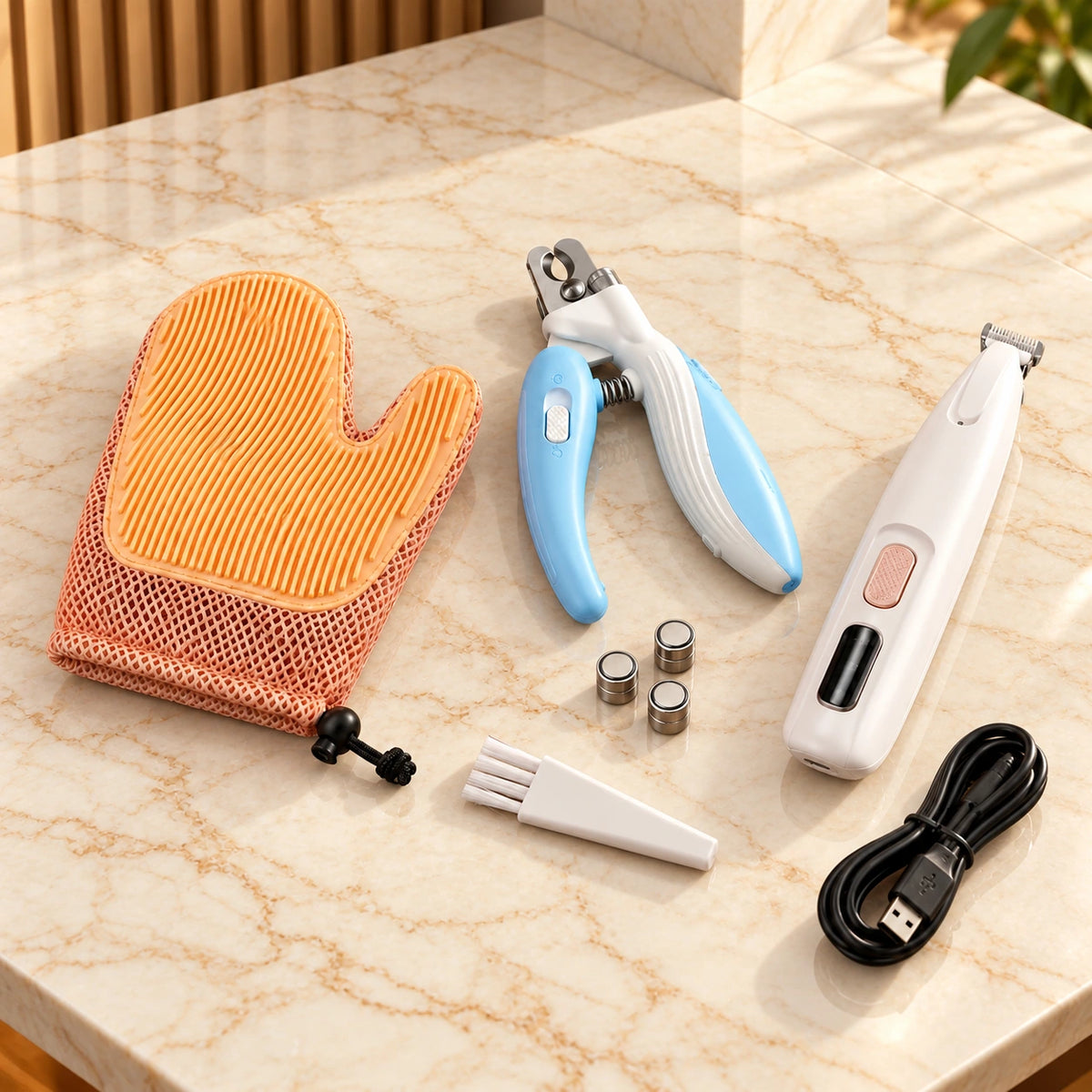 Pet grooming set with white trimmer, blue nail clipper, orange mitt, cable, brush and three button batteries