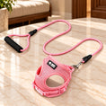 Charger l'image dans la visionneuse de la galerie, Pink mesh dog harness and matching rope leash with black foam handle on light ivory-beige marble
