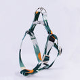 Load image into Gallery viewer, Close-up of green and white nylon dog harness with plastic buckle on white background
