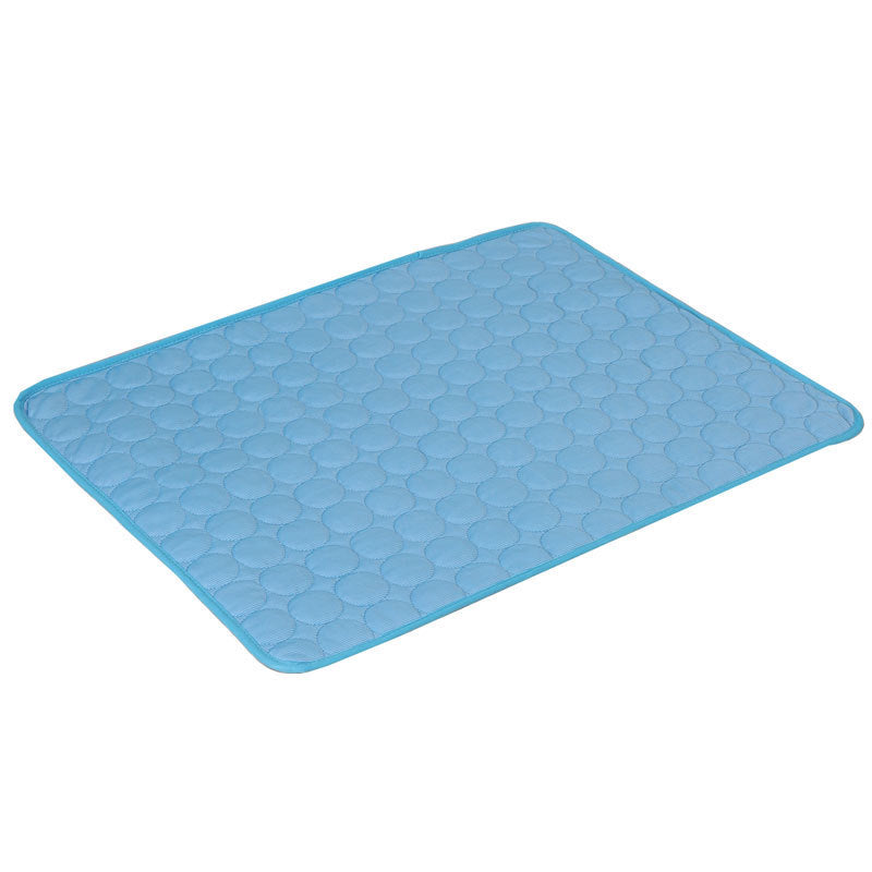 Blue quilted pet cooling mat laid flat