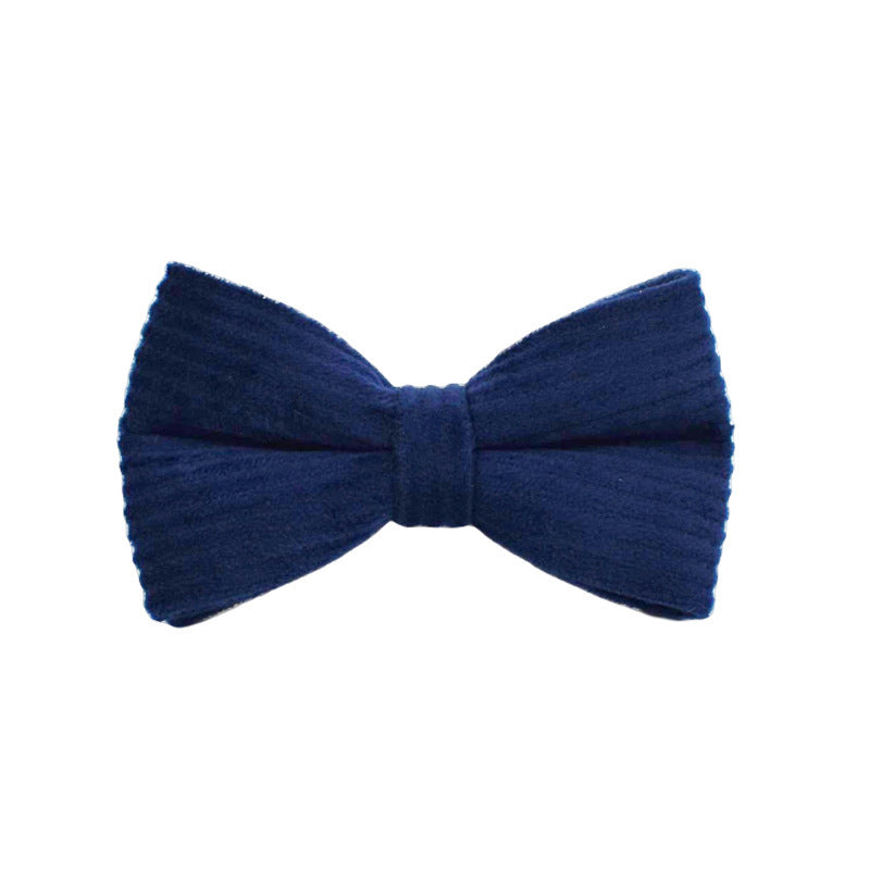 Close-up of navy blue corduroy bow tie for dogs