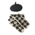 Load image into Gallery viewer, Black knitted beret and black-beige plaid knitted scarf laid flat on a white background

