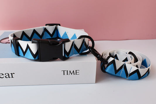 Blue and white geometric ethnic pattern nylon dog collar and leash with black hardware on white box