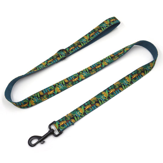 Fully extended green jungle print pet leash with black metal clasp and hand loop