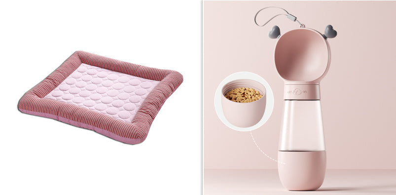 Pink cooling pet bed mat shown next to pink and gray pet feeder with heart-shaped handles and food bowl.