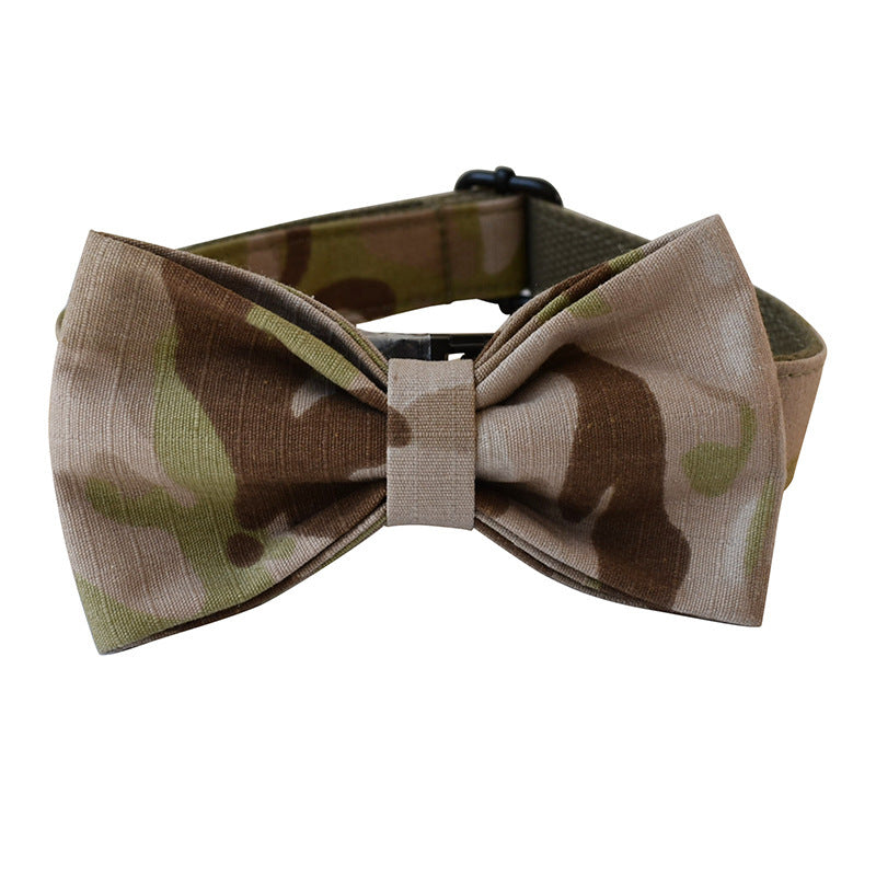 Front view of camouflage bow tie attached to adjustable dog collar