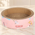 Load image into Gallery viewer, Pink illustrated cardboard cat scratcher bowl with balloons and animals on ivory marble
