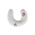 Load image into Gallery viewer, White crescent plush pet pillow with pink embroidered hearts on plain background
