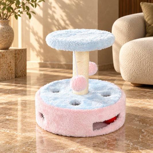 Blue and pink compact cat scratching post with sisal column, plush perch and play base on brown marble.