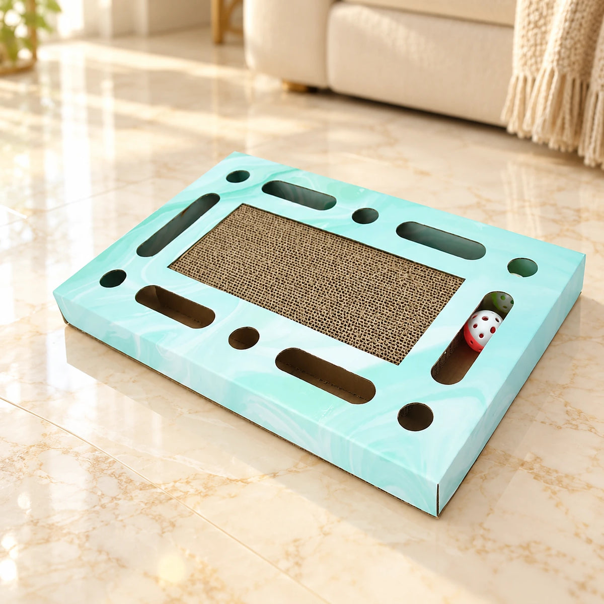 Rectangle mint corrugated cat scratcher on pale ivory marble